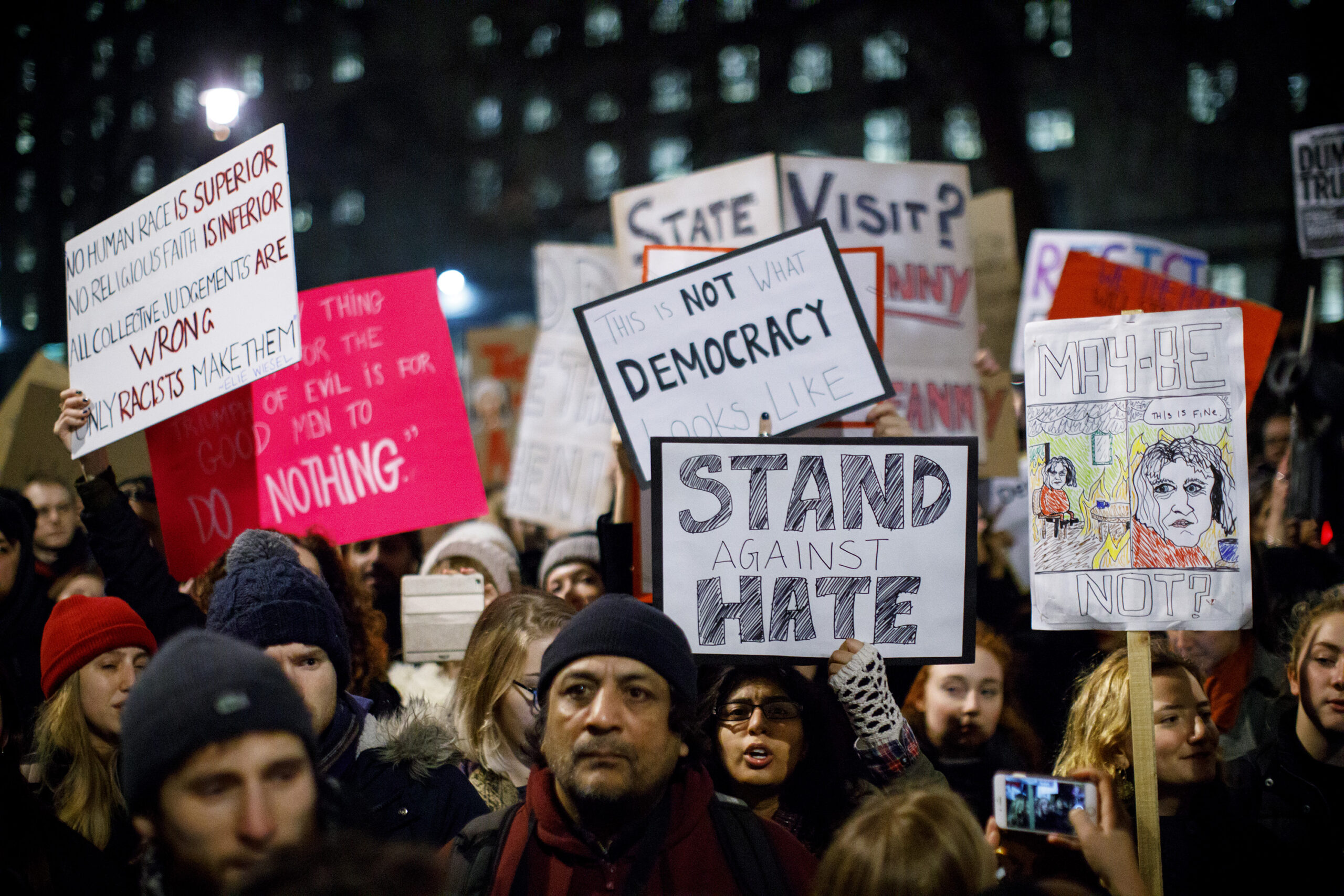 LONDON, UNITED KINGDOM - JANUARY 30:  People protest against the US travel and immigration ban from seven Muslim-majority countries and demand President Donald Trump's planned state visit to the UK to be cancelled outside Downing Street in London, England on January 30, 2017. ( Tolga Akmen - Anadolu Agency )